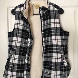 Black and white plaid vest.